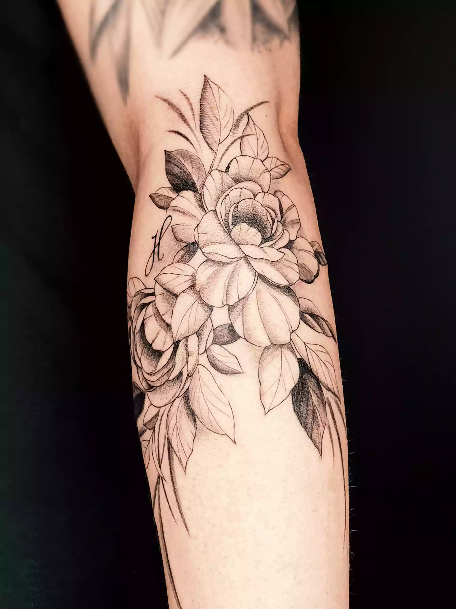 Blätter Tattoo auf Arm aus St. Gallen