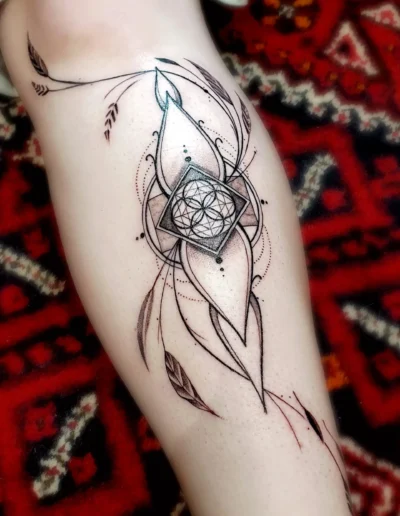 Geometrisches Weizen und Blätter Tattoo